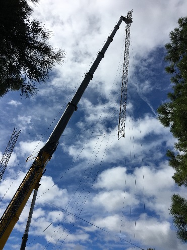 Crane lifting a tower section into place